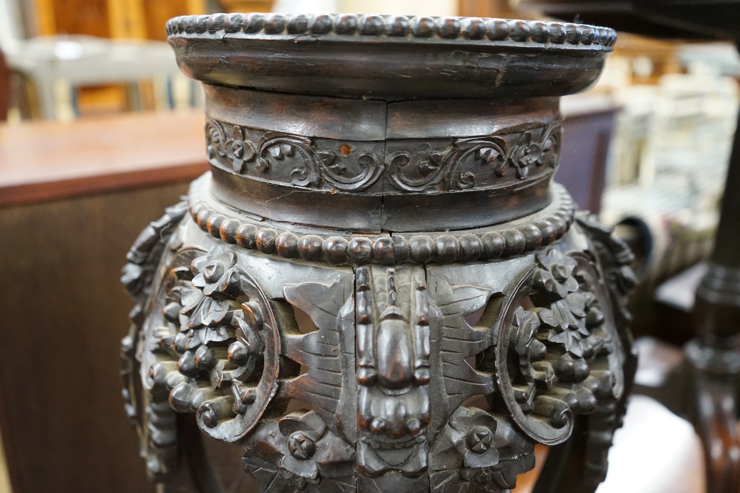 A Chinese carved hardwood marble topped vase stand, width 30cm, height 66cm